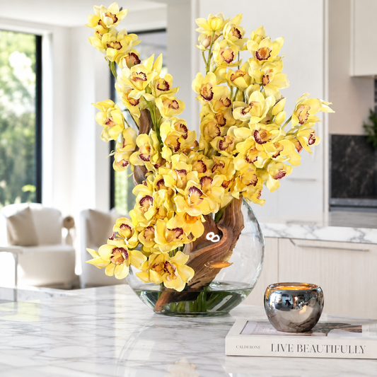 Cymbidiums Amarillos en Jarrón Luna para decoración de interiores | Vareluma